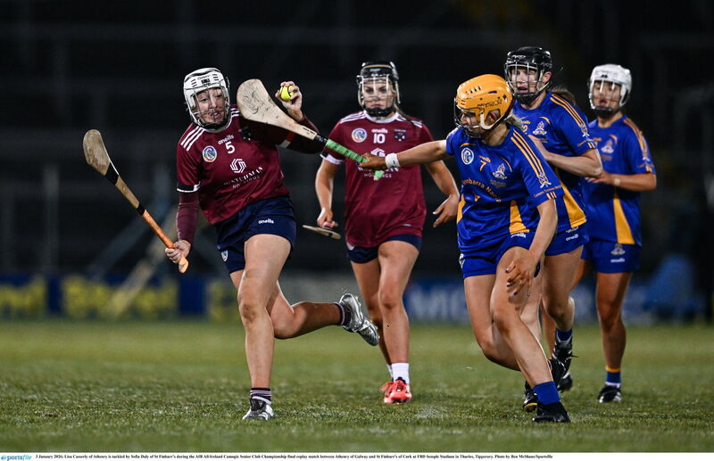 Lisa Casserly of Athenry is tackled by Sofia Daly of St Finbarr’s during the AIB All-Ireland Camogie Senior Club Championship final replay match between Athenry of Galway and St Finbarr's of Cork at FBD Semple Stadium in Thurles, Tipperary. Photo by Ben McShane/Sportsfile Lisa Casserly of Athenry is tackled by Sofia Daly of St Finbarr’s during the AIB All-Ireland Camogie Senior Club Championship final replay match between Athenry of Galway and St Finbarr's of Cork at FBD Semple Stadium in Thurles, Tipperary. Photo by Ben McShane/Sportsfile