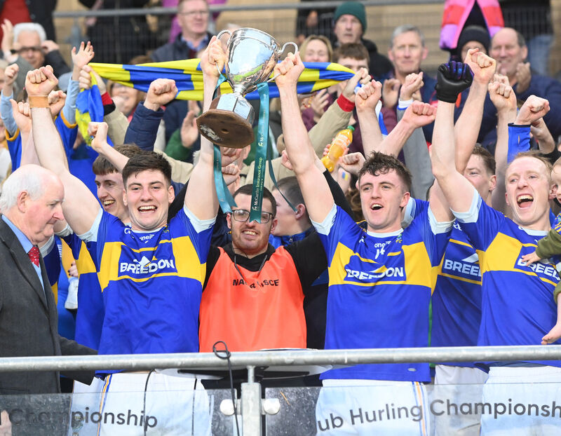 Kilshannig's Colm O'Shea and Éanna O'Hanlon raise the Billy Long Cup after defeating Aghabullogue in the McCarthy Insurance Group PIFC final replay in 2024. Picture: Eddie O'Hare