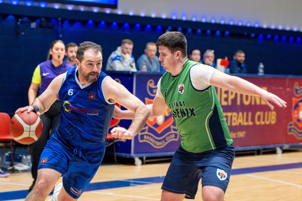Neptune’s Maks Dimitrov gets around the Belfast defence during the NICC Men’s National Cup at Neptune Stadium. Picture Chani Anderson