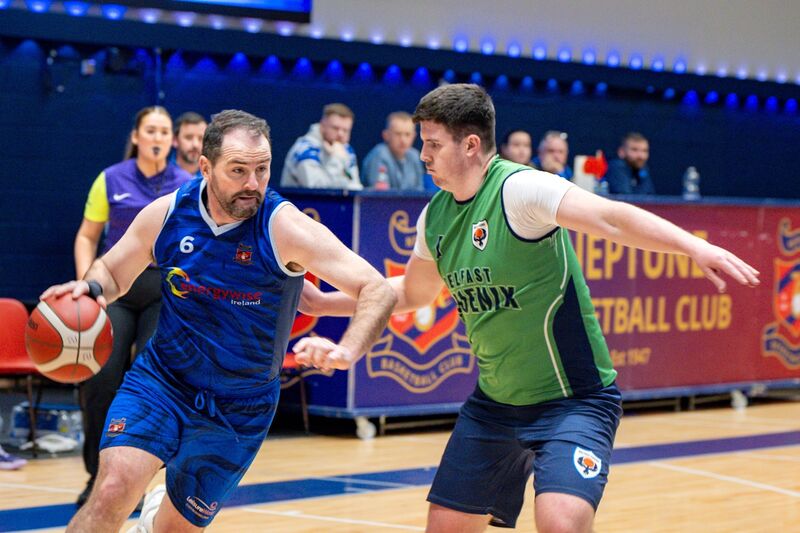 Neptune’s Maks Dimitrov gets around the Belfast defence during the NICC Men’s National Cup at Neptune Stadium. Picture Chani Anderson