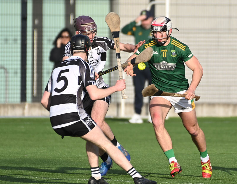 Cobh's Timmy Wilk is takes on Donoughmore's Rory Hanrahan and DJ Foley. Picture: Eddie O'Hare