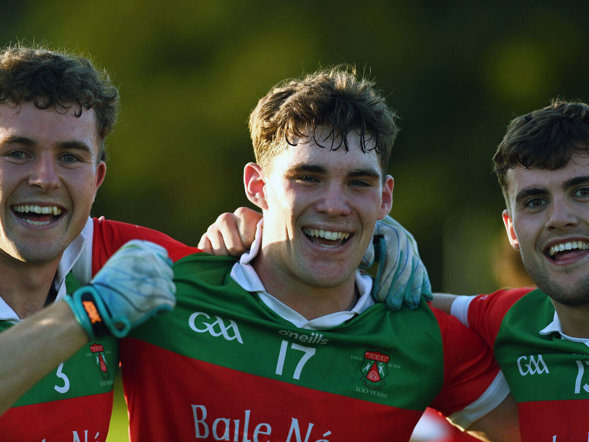A delighted Shane Kingston is flanked by team mates Neil Lordan and Michael Quirke following Ballinora's victory over Gabriel Rangers in the McCarthy Insurance Group IAFC quarter-final last year. Picture: Martin Walsh