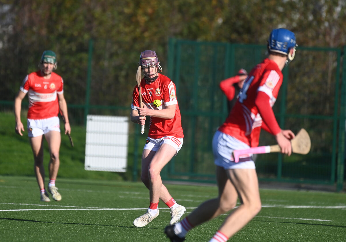  Alfie Hennessy in action for Midleton CBS as he drops the ball into Sam Ring to score a first-half goal against De La Salle, Waterford. Picture: Larry Cummins