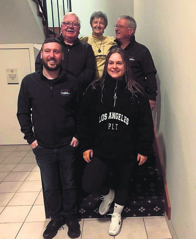 Kate Colbert Daly after her endurance fund-raiser with Graham Sheehan (left) and Philip Johnston (right) of Mallow Search and Rescue, and Rose and Brendan Ryan, the parents of her friend Cormac Ryan, who tragically died in 2020 in the River Lee
