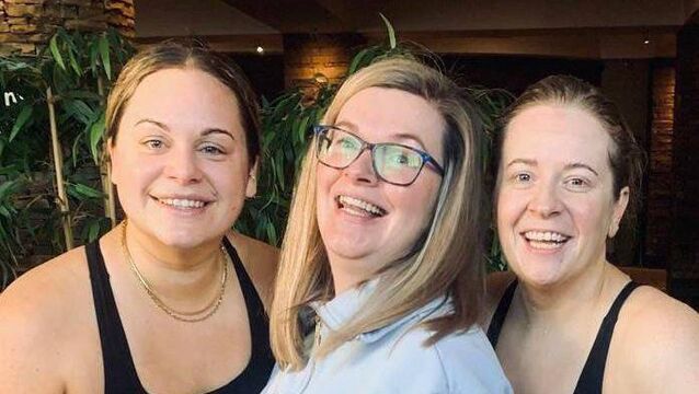 <p class="contextmenu internal_Caption">Kate Colbert Daly (left) with friends Emily Mangan (centre) and Michelle O’Brien after completing her marathon swimming challenge at Garryvoe Hotel and Health Club’s swimming pool</p>
