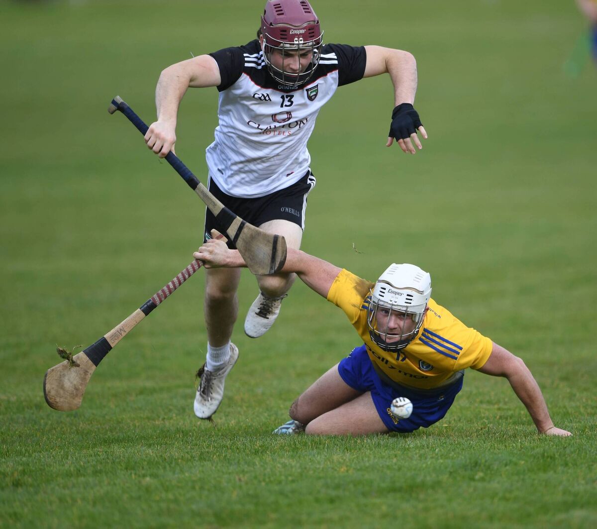Roscommon defender Paul Dolan tries to prevent Sligo forward Andrew Kilcullen from getting to possession during Sunday's Christy Ring Cup encounter at Athleague. Picture: Gerard O'Loughlin