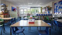 Empty Tables And Chairs In Primary Or Elementary School Classroom