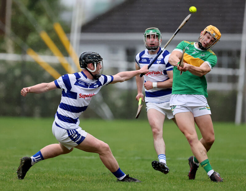  James Kearney of Castlelyons gets his shot away as Inniscarra's Cormac Dineen closes in in last September's Co-op SuperStores SAHC game. Picture: Jim Coughlan