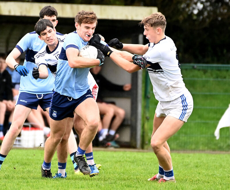 Clonakilty Community College's Olan Murphy is tackled by Coláiste Choilm's Riain Coakley last year. Picture: Eddie O'Hare