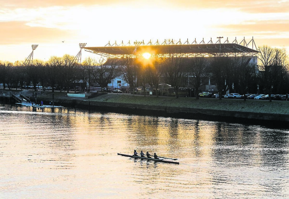 Members of the Cork Boat Club on the water recently as the sun rises behind SuperValu Páirc Uí Chaoimh.	Picture: David Creedon
                    