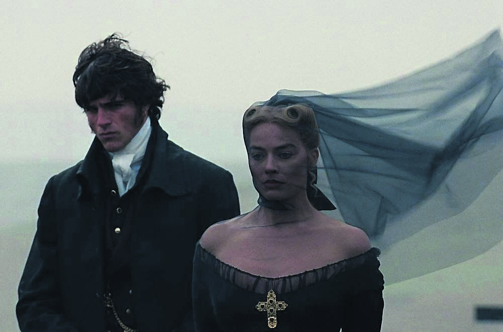 Wuthering Heights stars Jacob Elordi as Heathcliff and Margot Robbie as Cathy. Picture: Courtesy Warner Bros.
                    