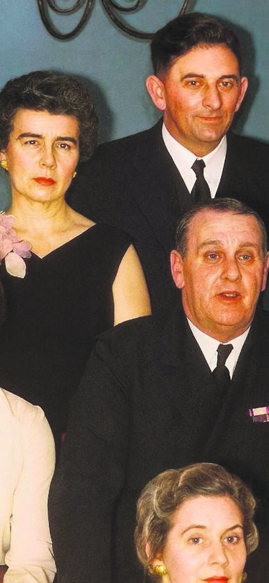 Tom Ryan at a function in 1960, wearing his service medals. Behind him are his wife, Maura, nee McCarthy, originally of Golden Villas, Common’s Road, Cork, and Donal Crosbie, director of Examiner Publications and then Chief Civil Defence Warden for Cork city