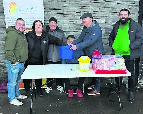Kenneth Collins, Michelle O’Connell, Denis Cooke, Thomas ‘Golly’ Flynn, Mick Nugent, and Conor Connolly at the Shine a Light hamper draw.