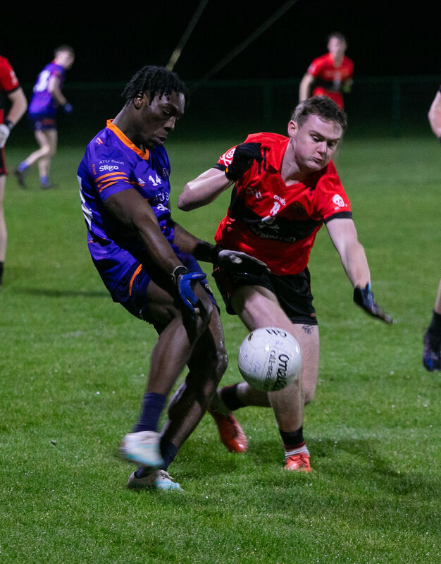 ATU Sligo's Emmanuel Shehu and UCC's Conor Daly in action last week. Picture: Gareth Chaney