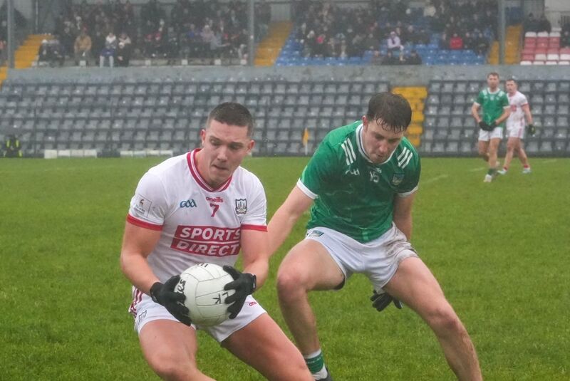 Cork's Darragh Cashman breaks away from Robbie Childs of Limerick. Picture: Noel Sweeney