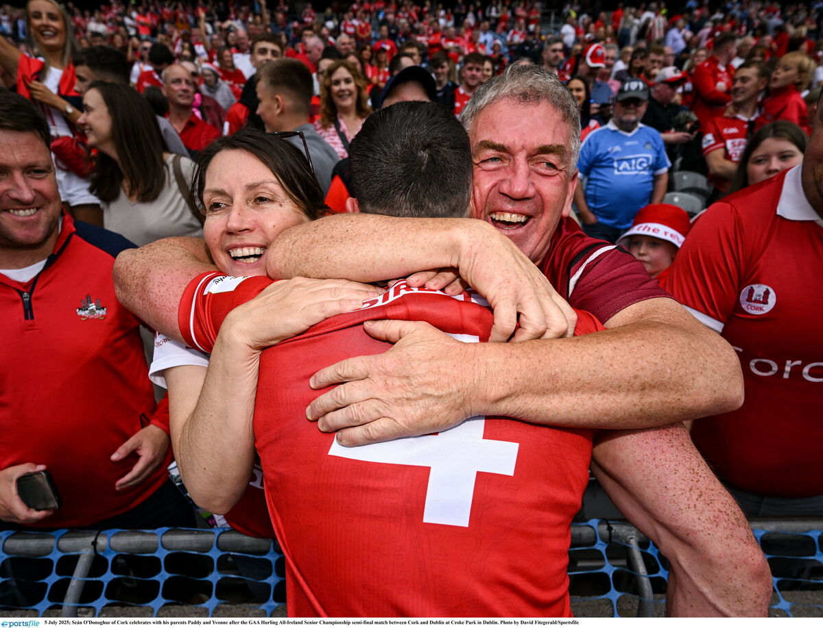 Seán O'Donoghue of Cork celebrates with his parents Yvonne and Paddy after a game. Picture: David Fitzgerald/Sportsfile