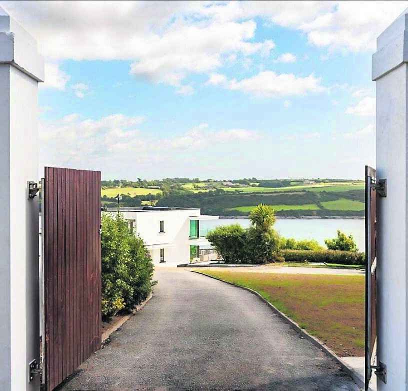 92, Carleton Village, is on sale for €800,000, a new build that basks in the stunning vistas of Youghal Bay