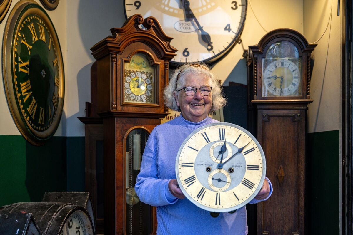 Sally Stokes of Stokes Clocks on MacCurtain Street holding a restored clock face, proud to contribute her craft to the restoration of Shandon’s Four-Faced Liar. Picture Chani Anderson