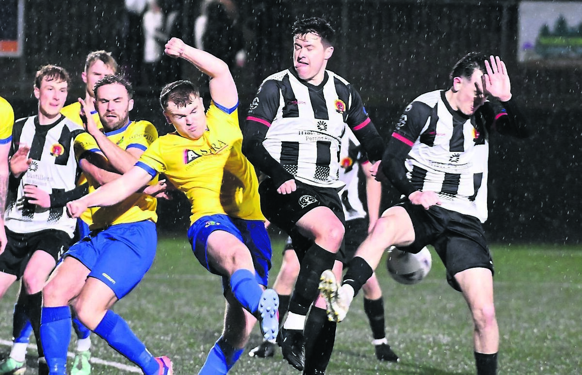Carrigaline United’s David Crotty clears from Midleton’s Jake Hegarty and Luke Murray-Duggan during the Beamish Stout MSL Premier division game at Ballea Park.	Picture: Eddie O’Hare
                    