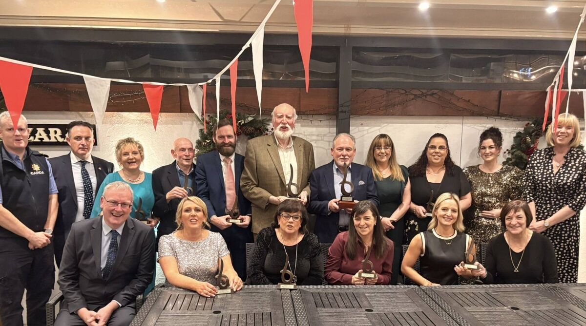 Blarney Person of the Month winners with award organisers Kate Durrant, Damian Boylan, and John Henchion, and Garda Sean O’Dwyer.