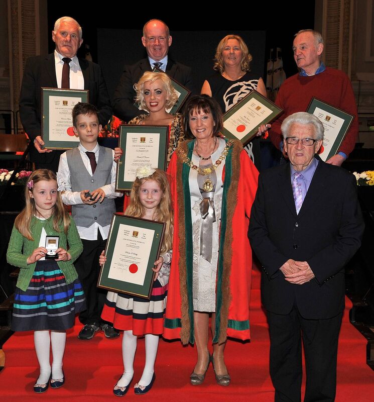 In 2014, Deirdre was awarded a civic award from the Lord Mayor. Pictured here are the then Lord Mayor, Cllr Catherine Clancy, with civic award recipients at the Lord Mayor's Civic Awards and Community &amp; Voluntary Awards ceremony in 2014 at City Hall. Included are Eamonn Ryan, Declan Kidney, Mary Newman, Arthur Leahy, Pamela O'Connor and her son Scott and Michael O'Reilly with his granddaughters Maggie and Hannah  who accepted the award on behalf of Evening Echo reporter Deirdre O'Reilly. Picture: David Keane.