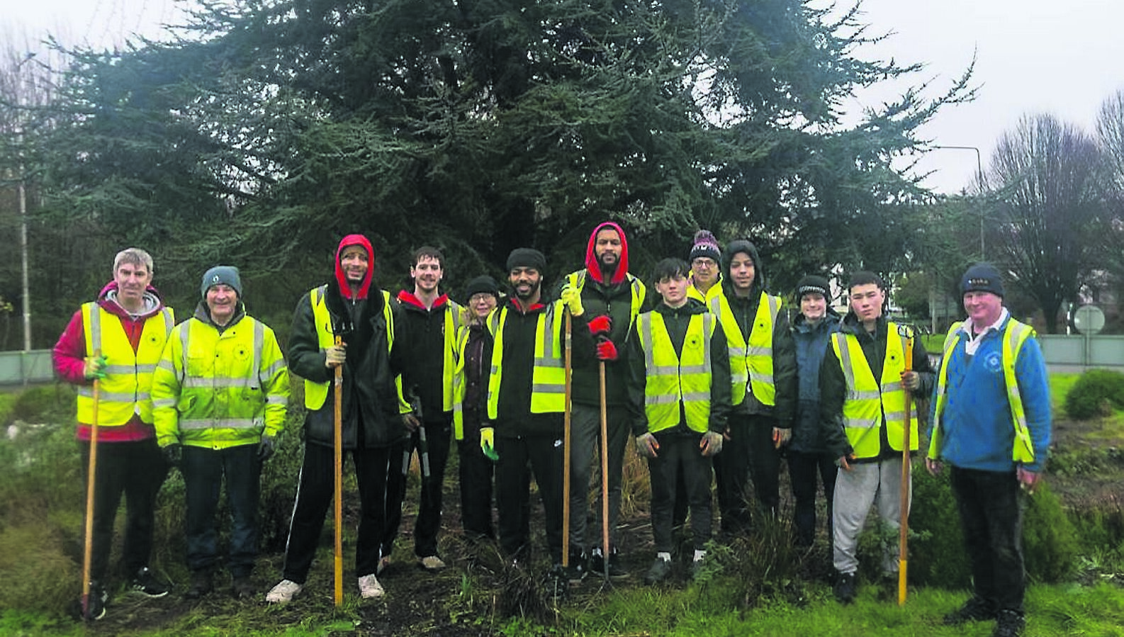 All About Cork: Basketball team members help out Tidy Towns team