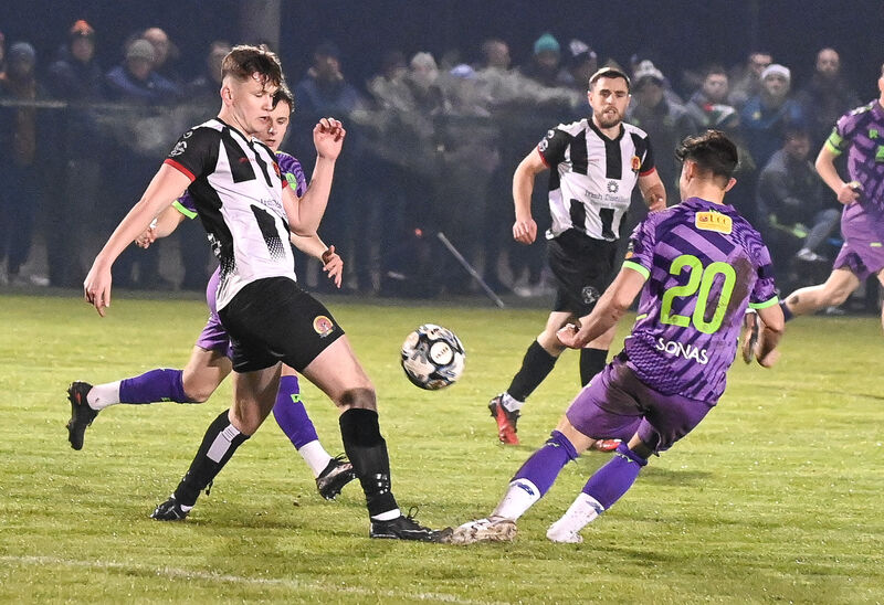  Midleton's Jamie Collins battles with Cork City's Matthew Murray. Picture: David Keane.