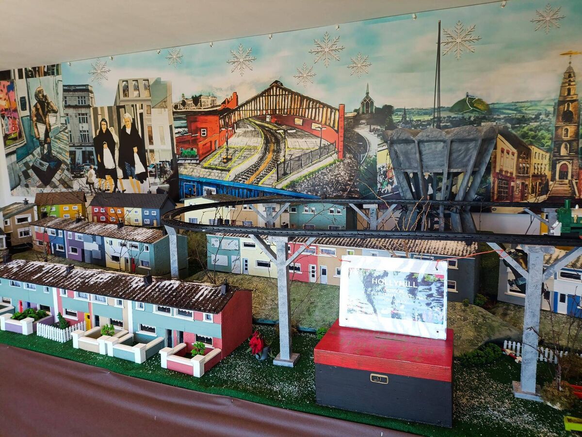 ‘The Hollyhill Express: A Northside Christmas Journey,’ with iconic images of Cork in the background.