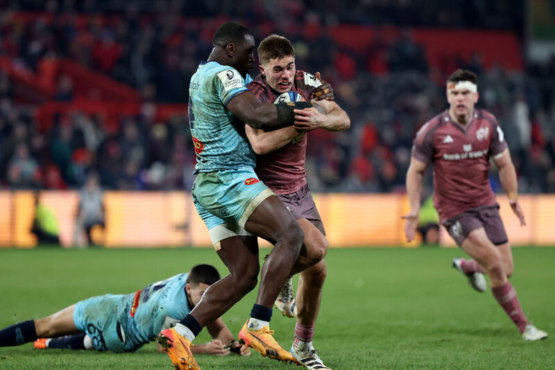 Munster Rugby's Jack Crowley is tackled by Castres' Christian Ambadiang. Picture: Damien Eagers/PA Wire.