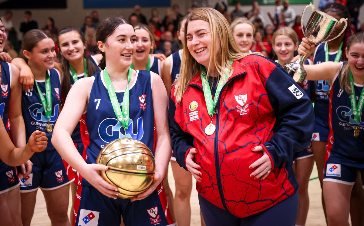 DEDICATED: MVP Abbie Lyons of Gurranabraher Credit Union Brunell celebrates winning with assistant coach Danielle O’Leary, who is nine months pregnant. Picture: INPHO/Tom Maher