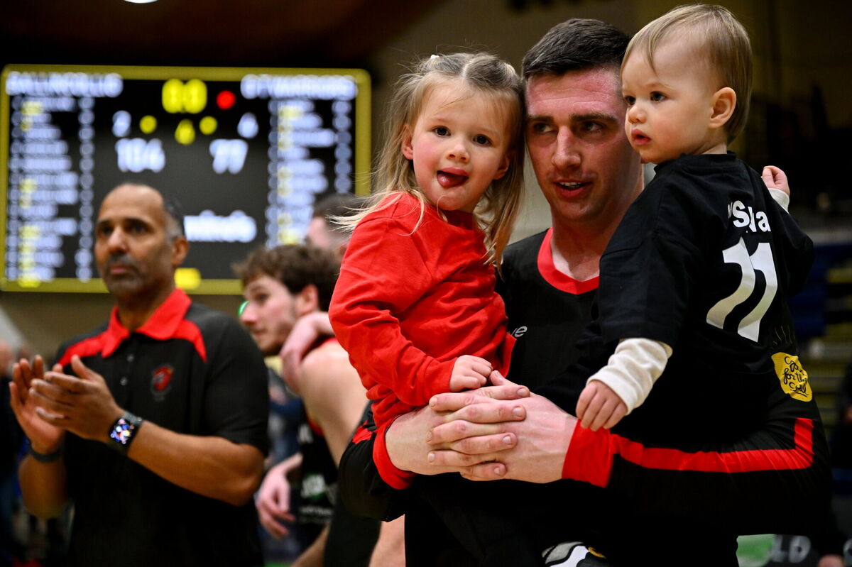 Ballincollig player and head coach Ciarán O'Sullivan celebrates with his children Emma, left, and Dylan after the Domino’s MSL National Cup final match between Garveys Tralee Warriors and Ballincollig at the National Basketball Arena in Tallaght, Dublin. Photo by Shauna Clinton/Sportsfile