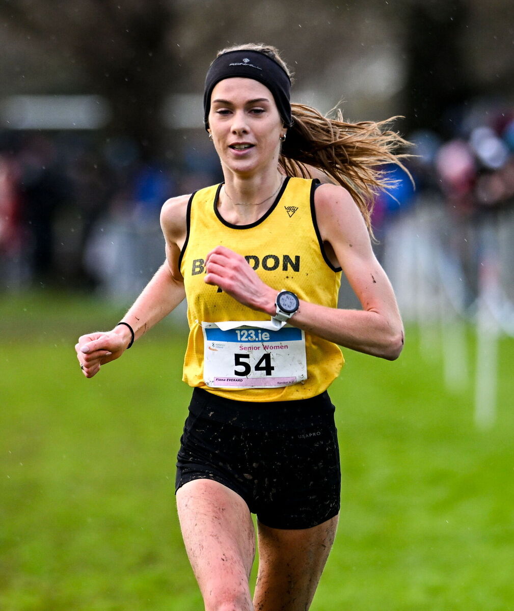 Fiona Everard of Bandon AC, Cork, crosses the finish line to win the senior women's 123.ie National Cross Country Championships at Templemore Sports Complex in Derry. Picture:  Ramsey Cardy/Sportsfile