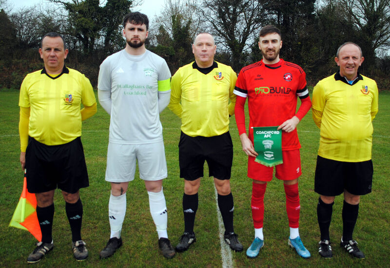 Referee Alan McDonagh is flanked by Coachford's Mark Murphy (left) and Tralee Dynamos' Shane Lowth, with assistants Stephen Moore and Paul Bowdren. Picture: Barry Peelo.