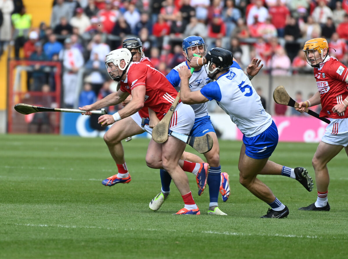Cork's Patrick Horgan breaks between Waterford's Paddy Leavey and Mark Fitzgerald. Picture: Eddie O'Hare