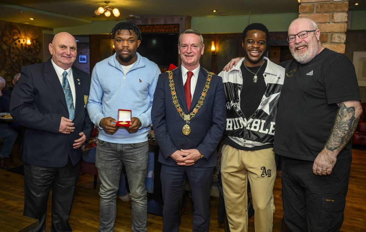 Lord Mayor Fergal Dennehy presenting Jack McAuliffe Medals to All-Ireland Champion Boxers Ola Wahab and Jay Mbuyi Tshiswoka with coaches Paddy McSweeney of Spartan BC and John Morrissey, Golden Gloves BC. Picture: Doug Minihane 
