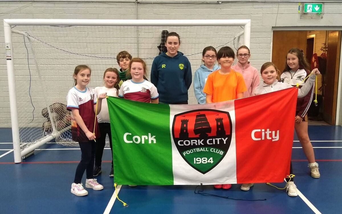 Cork City Women’s captain Ciara NcMamara with Blackstone Rovers schoolgirls at a training session.