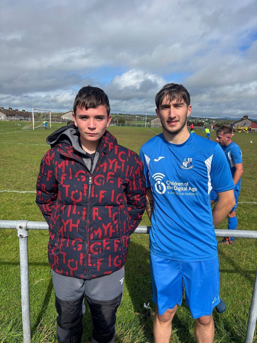 Blackstone Rovers U15 captain Lennix Leahy with senior captain Sean Daly before a game at Fairfield.