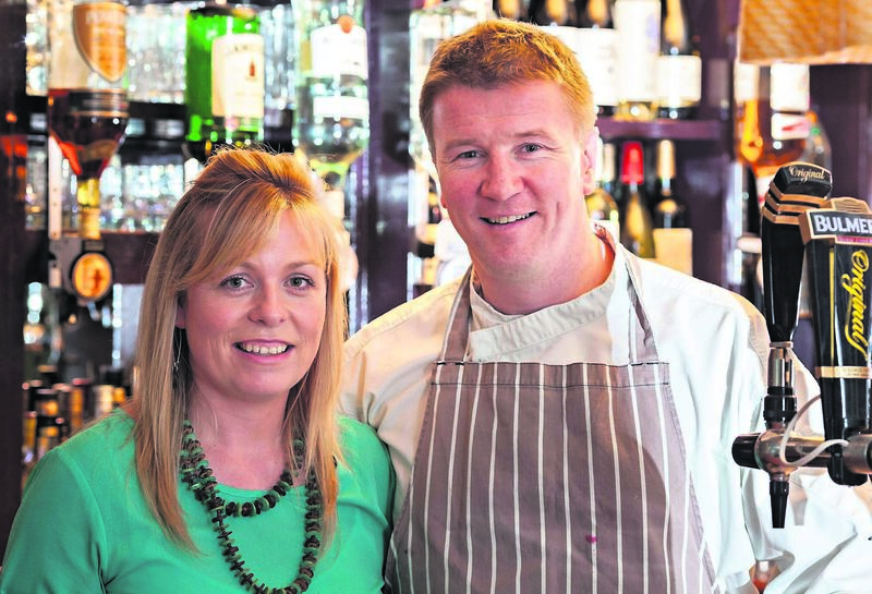Catherine and Barry McLoughlin behind the bar at Poachers restaurant in Bandon in 2017 and 