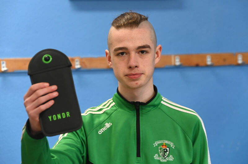 Calvin O'Connor with one of the lockable YONDR mobile phone pouches. Picture: Larry Cummins. Calvin O'Connor with one of the lockable YONDR mobile phone pouches. Picture: Larry Cummins.