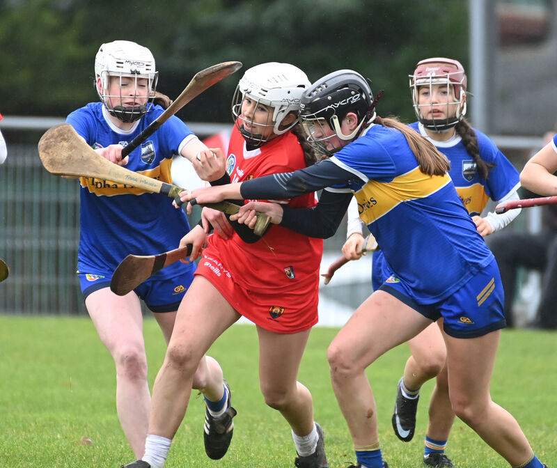 Cork's Isabelle O'Callaghan is tackled by Tipperary's Kate Duffy and Tara Maher. Picture: Eddie O'Hare Cork's Isabelle O'Callaghan is tackled by Tipperary's Kate Duffy and Tara Maher. Picture: Eddie O'Hare