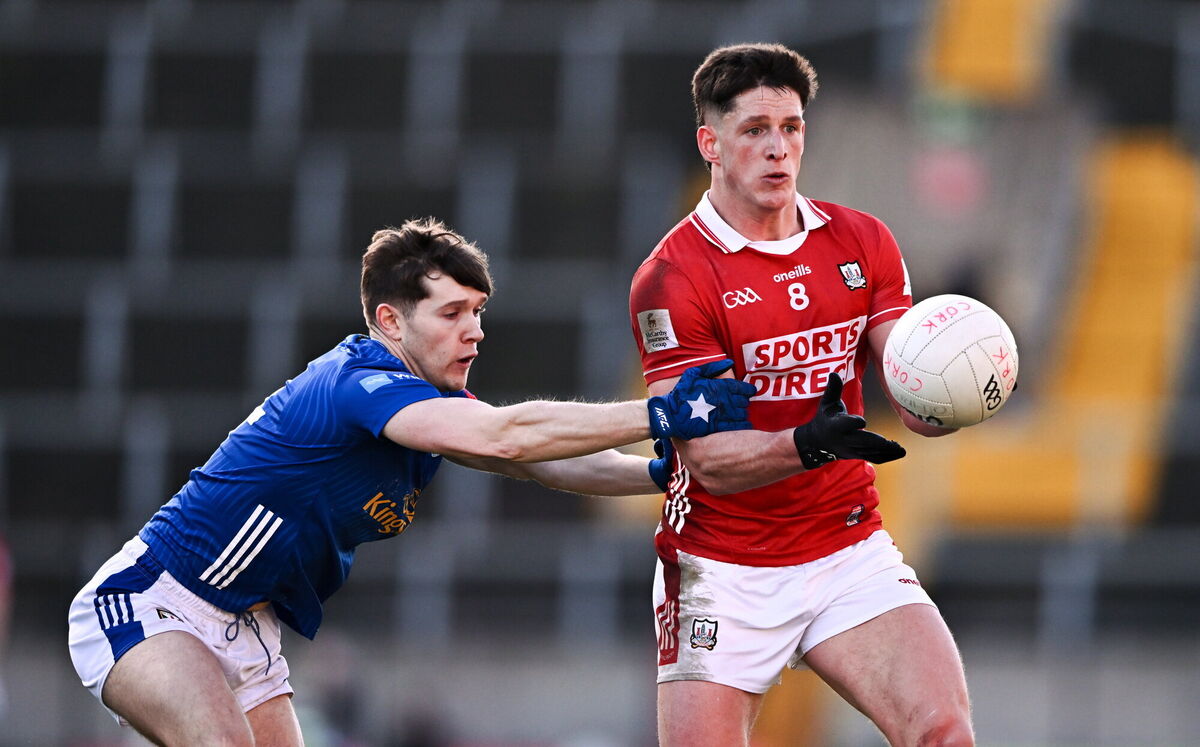 Colm O'Callaghan of Cork in action against Paddy Meade of Cavan. Picture: Ben McShane/Sportsfile