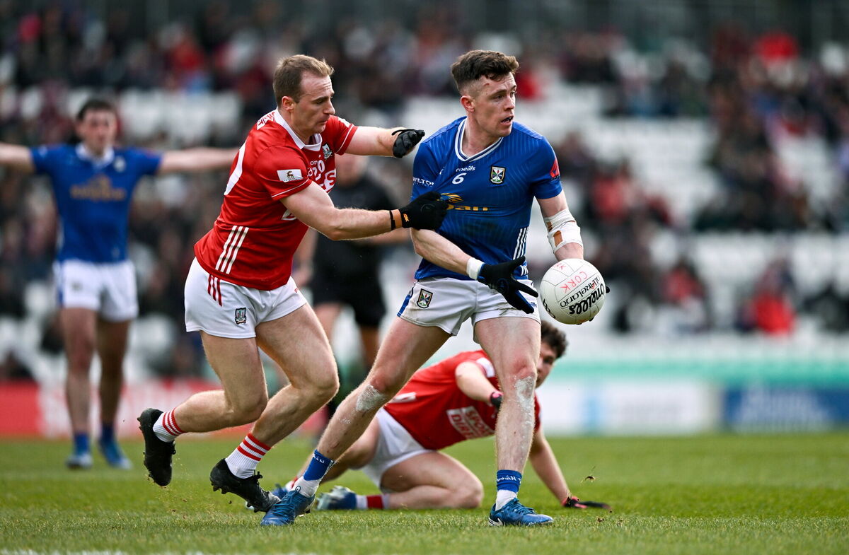 Dara McVeety of Cavan is tackled by Matty Taylor of Cork. Picture: Ben McShane/Sportsfile Dara McVeety of Cavan is tackled by Matty Taylor of Cork. Picture: Ben McShane/Sportsfile