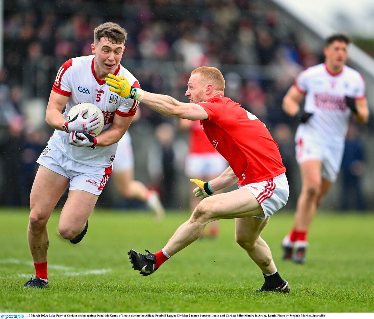 Luke Fahy of Cork in action against Donal McKenny of Louth in 2023. Picture: Stephen Marken/Sportsfile