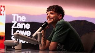 Louis Tomlinson struggled to write songs about anything other than Liam Payne