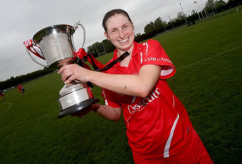 Cork captain Amanda O'Regan with the Division 2 trophy /Mandatory Credit Â©INPHO/Donall Farmer