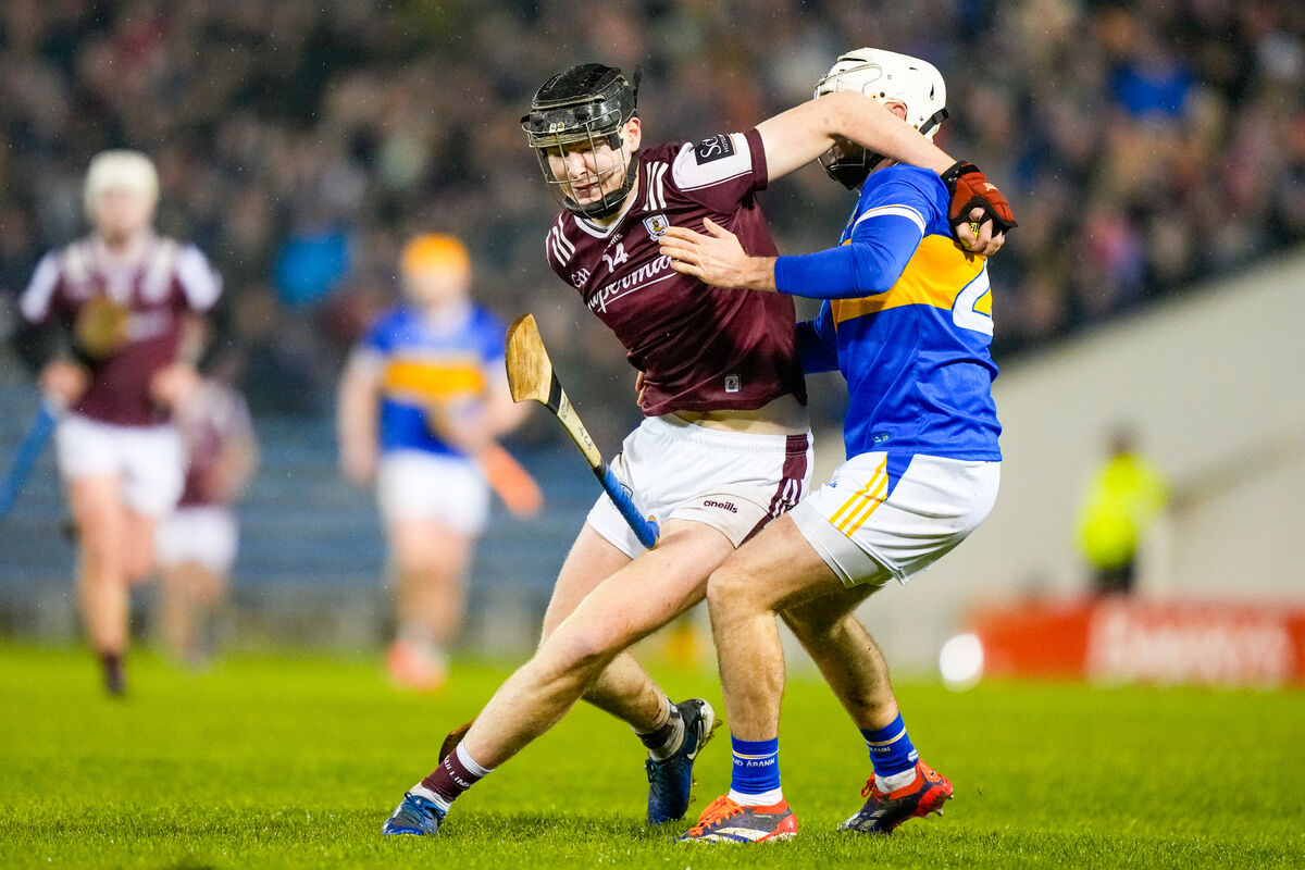 Jason Rabbitte of Galway is tackled by Johnny Ryan of Tipperary. Picture: INPHO/James Lawlor