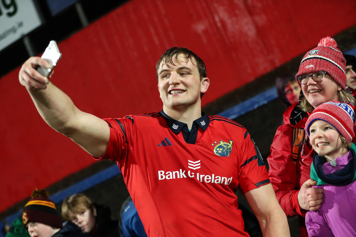 Munster's Gavin Coombes takes a selfie with fans. Picture: INPHO/Tom O’Hanlon