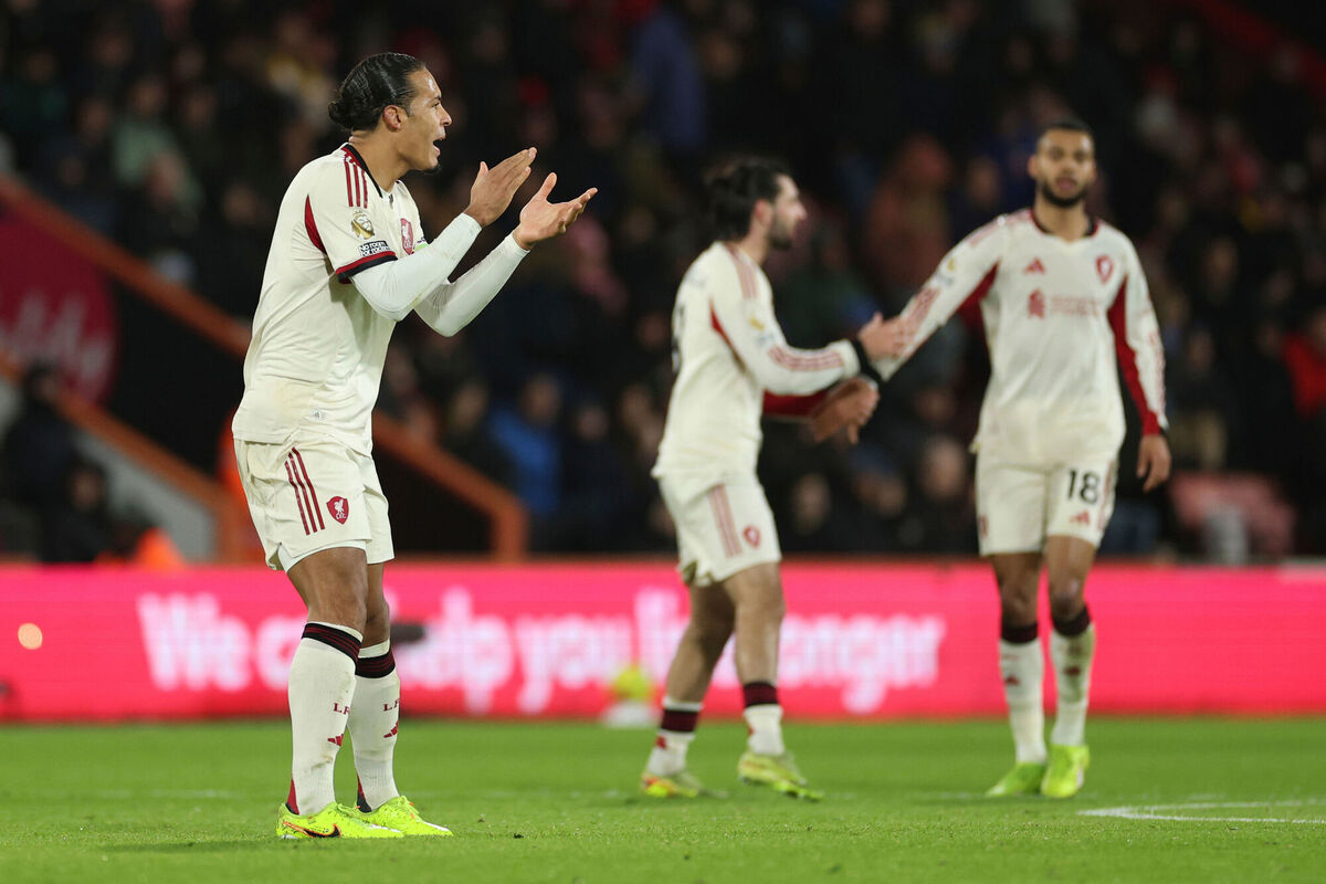 Liverpool's Virgil van Dijk urges his side on as he waits in the English Premier League  match against Bournemouth Picture: AP Photo/Ian Walton