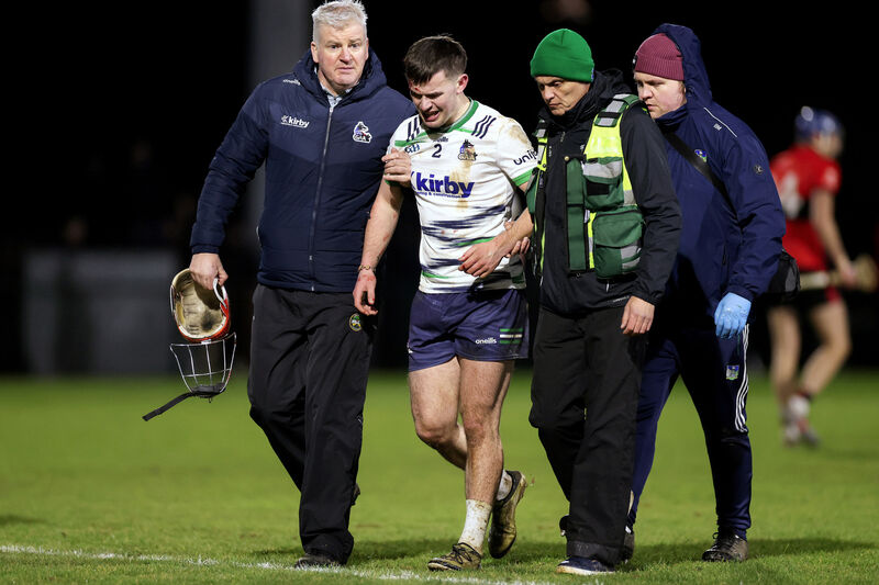 University of Limerick's Ciarmhac Smyth leaves the game with an injury after Michael Mullaney's challenge. Picture: ©Inpho/Laszlo Geczo