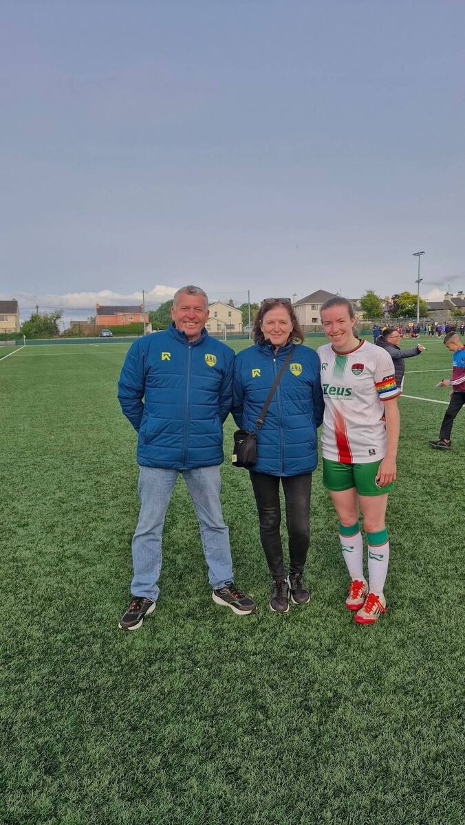 Shaunagh with her parents Lesley and Terry who attend every home and away game 